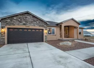 Ranch home built by Sky Creek Homes in Pueblo West with stucco and rock exterior