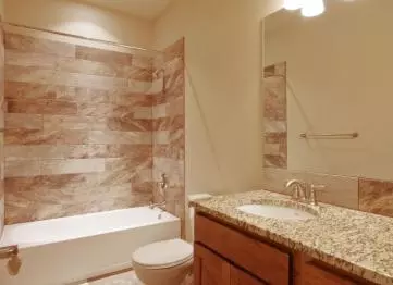 The movement in tile can add a depth and spaciousness to a room.