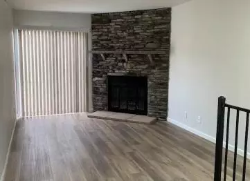 Sky Creek Homes remodels fireplaces. Here they installed floor to ceiling stacked stone fireplace