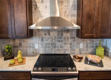 A custom vent hood can be the focal point of the kitchen.