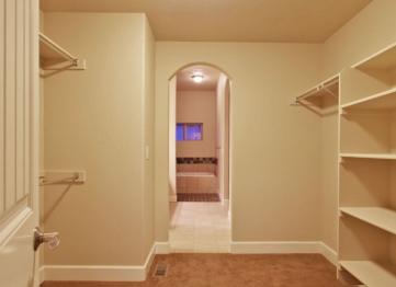 Some of Sky Creek Homes floor plans feature large walk-in closets with built in shelves perfect for all your shoes.